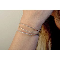 Avvolgente Anello in Due Colori Oro e Brillanti | Tre Giri di Brillanti